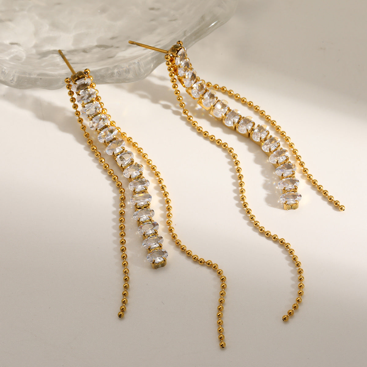 Oval stone tassel earrings
