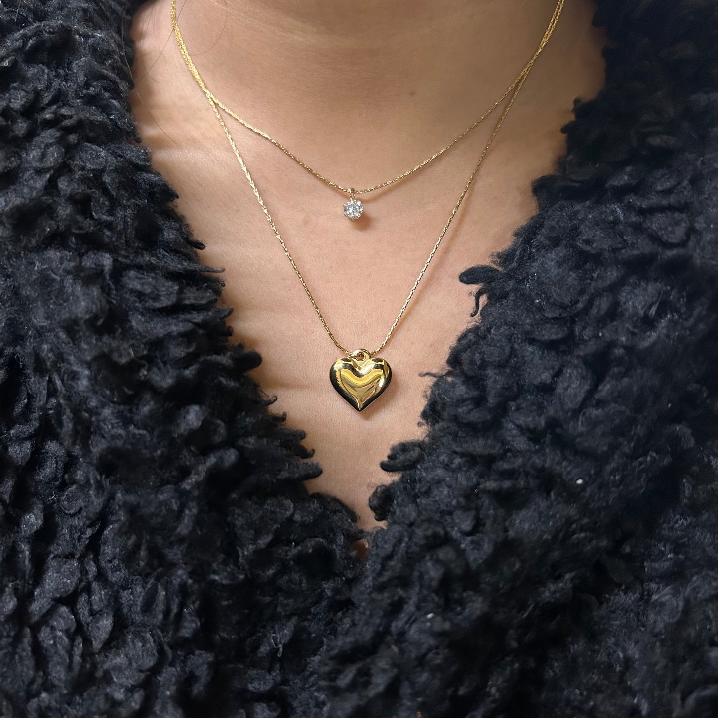 Dual heart necklace with tiny stone