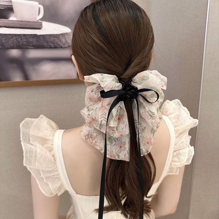 Floral bow ( claw clip)