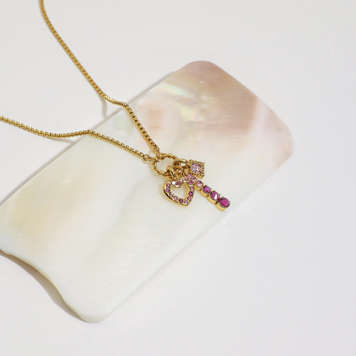 Pink charm necklace