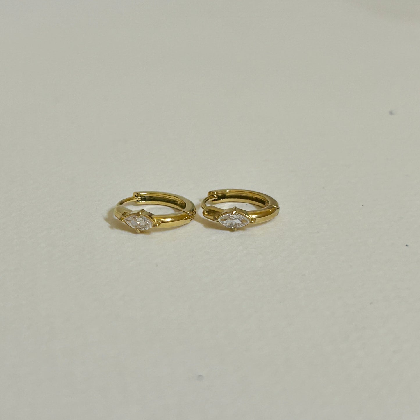 Single stone huggies