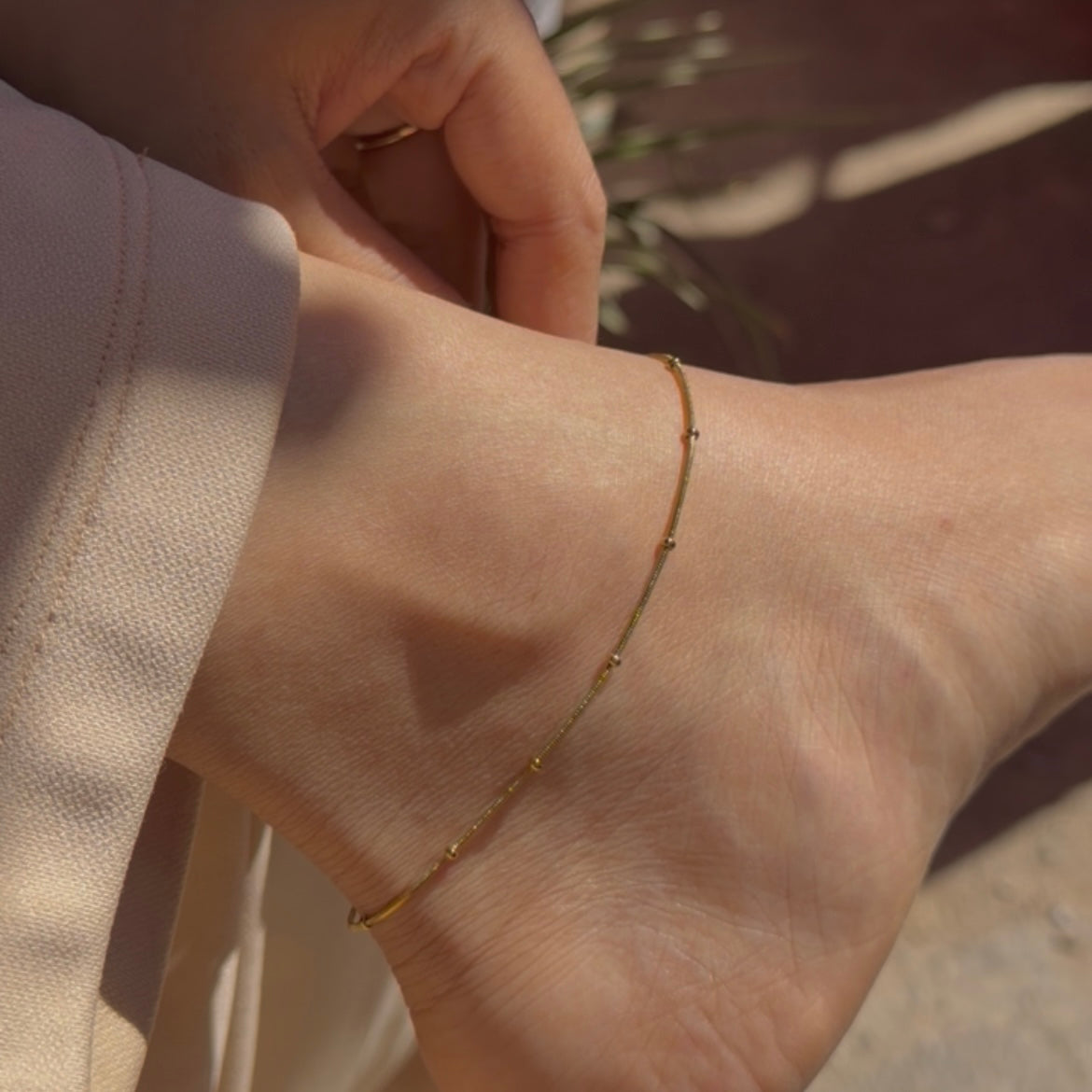 Round snake with tiny bead