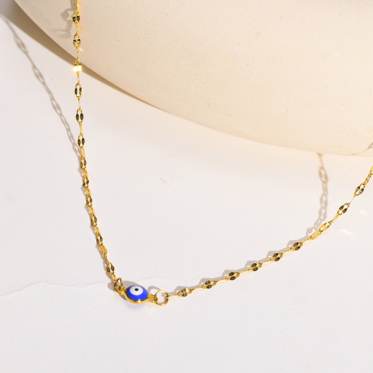 Tiny evil eye necklace