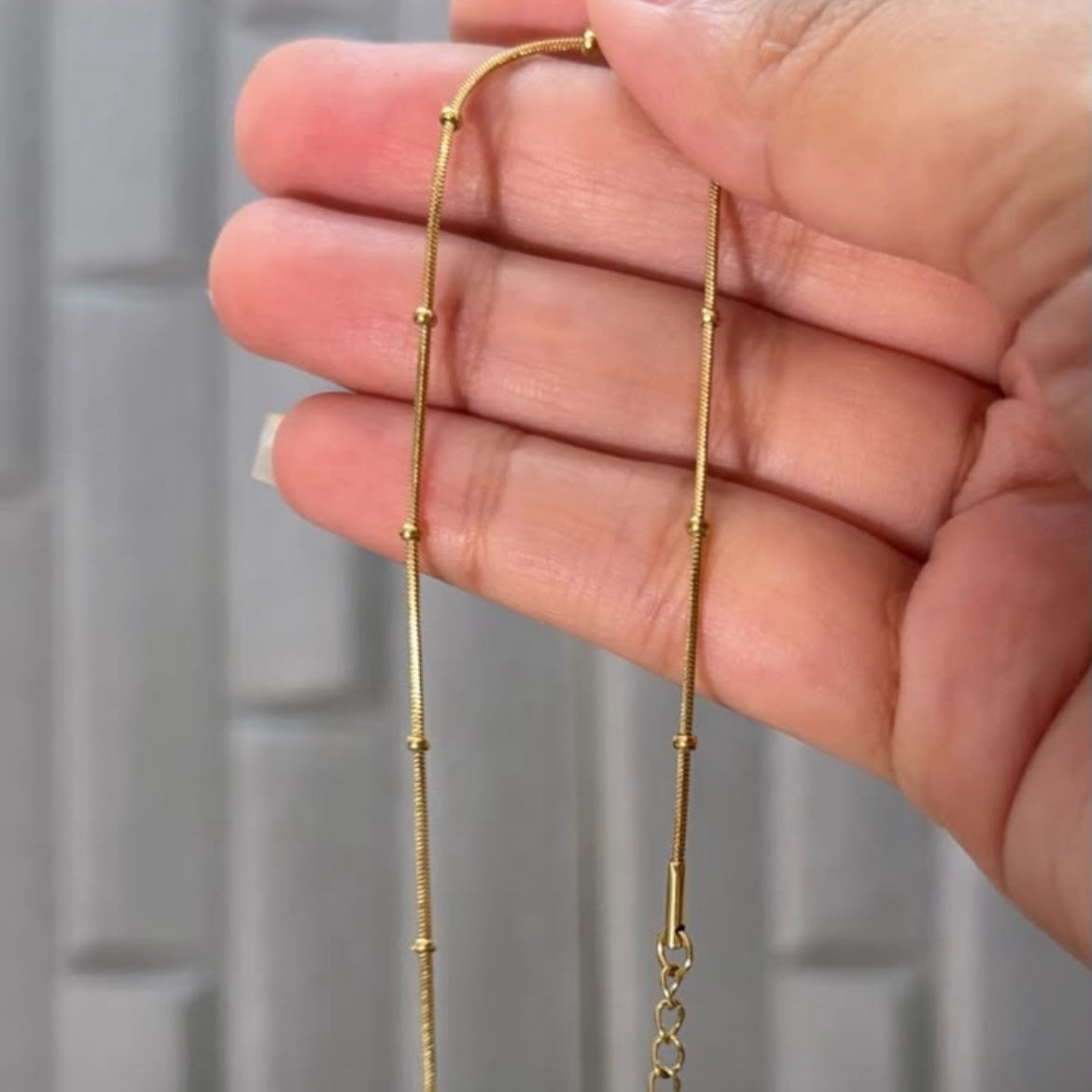 Round snake with tiny bead