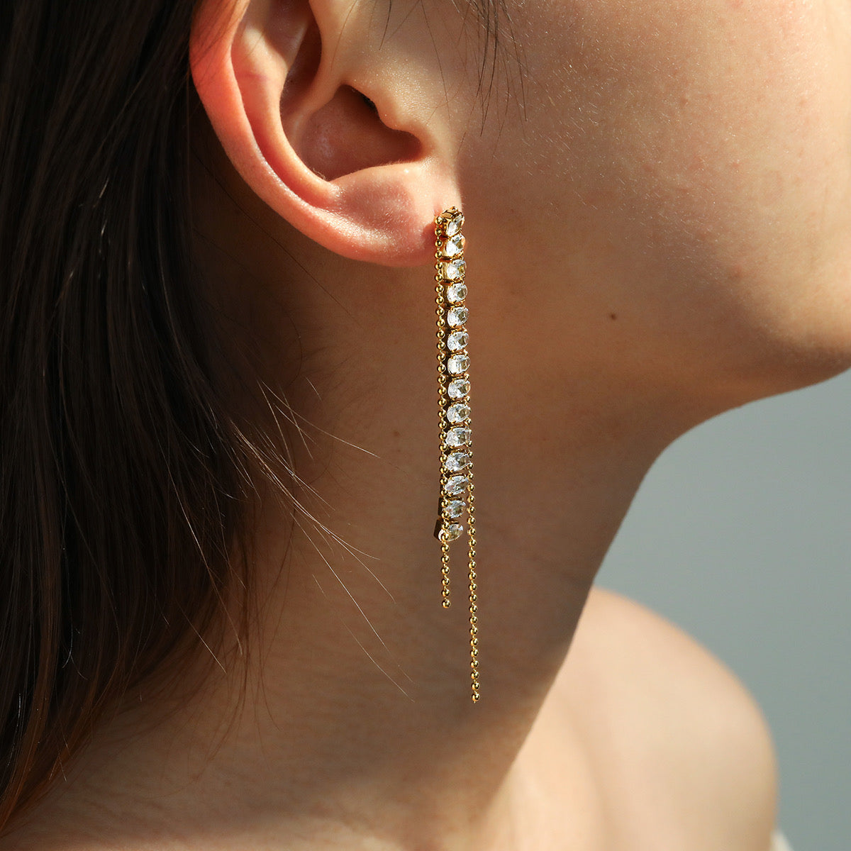 Oval stone tassel earrings