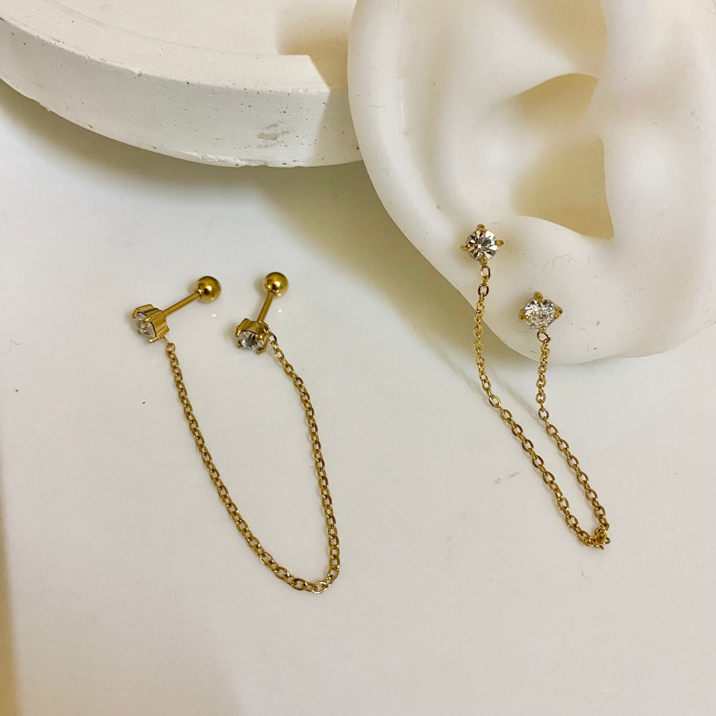 Piercing chain earrings